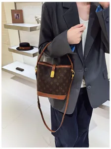 Vintage monogram bucket bag for women, luxury style shoulder crossbody bag with print.