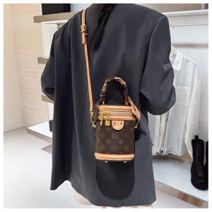 Sac bandoulière cylindre monogramme rétro pour femmes, sac seau vintage avec poignée.