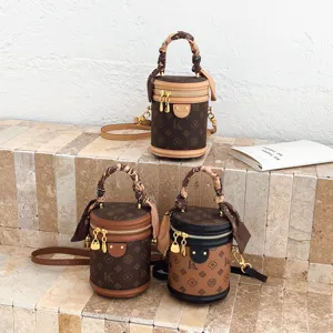 Sac seau cylindrique vintage pour femme, sac à bandoulière monogramme rétro avec poignée foulard.