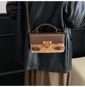 Retro quilted shoulder bag for women, chic patchwork design with metal lock closure and handle.