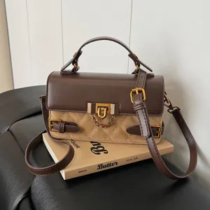 Vintage quilted top handle shoulder bag for women, classic PU leather crossbody bag chic.