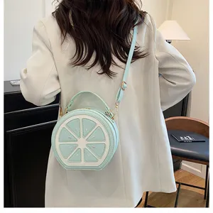 Borsa a tracolla rotonda a forma di limone per donna, elegante borsa in ecopelle.