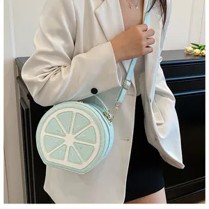Borsa a tracolla rotonda chic a forma di limone da donna, carina borsa in pelle PU
