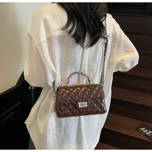Chic brown quilted chain shoulder bag for women, elegant crossbody bag with metal strap.