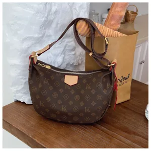 Brown monogram crescent hobo bag stylish leather trim shoulder crossbody bag for women daily use