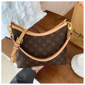 Stylish brown monogram shoulder bag for women, classic hobo crossbody commuting design.