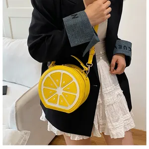 Simpatica borsa a tracolla a forma di limone da donna, borsa rotonda gialla creativa con manico.