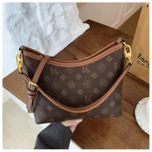 Fashionable monogram shoulder bag for women, retro print crossbody commuter hobo bag stylish.