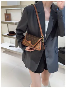 Classic vintage monogram contrast underarm shoulder bag for women, stylish crossbody bag.