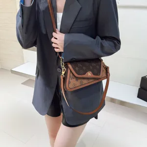 Stylish women's monogram crossbody shoulder bag with chic color block design and trendy look.