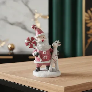 Resin Christmas Santa figurine detail showing glitter finish, candy cane and cute reindeer.