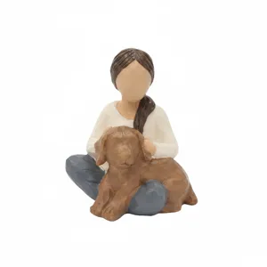 Resin girl holding dog figurine sculpture, carved art style decor for home interior display.