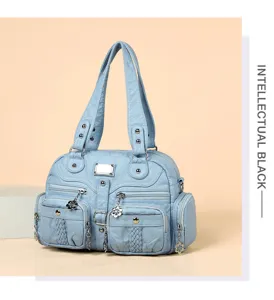 Close-up detail of the blue PU leather vintage multi-pocket shoulder bag with metal hardware.
