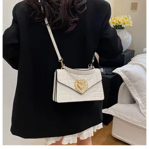 Borsa tracolla bianca motivo coccodrillo con serratura a cuore dorata, elegante borsa donna.