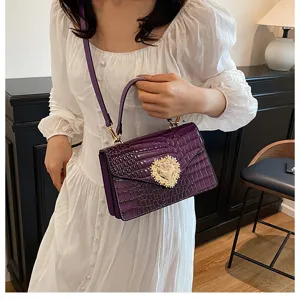 Borsa a tracolla viola coccodrillo per donna, elegante borsa con chiusura a cuore.