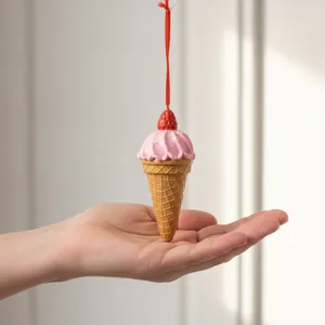 Resin strawberry ice cream cone hanging ornament, cute Christmas tree decoration detail view.