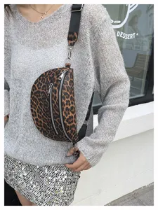 Trendy leopard print crossbody bag for women, stylish PU leather chest and waist bag with wide strap.
