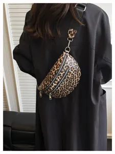 Close-up detail of stylish leopard print chest sling bag with zipper and strap.