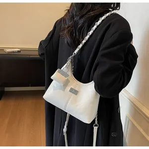 Stylish chic patent leather shoulder bag with metallic chain strap and mini pouch for women