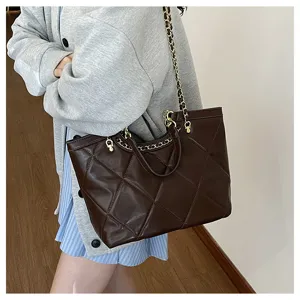 Stylish women's large capacity quilted tote bag with elegant chain strap for daily work commute.