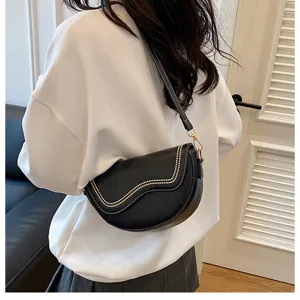 Black PU leather saddle bag with chic gold studded wave detail, stylish underarm shoulder bag.