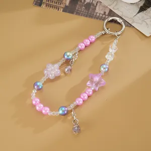 Cute pink beaded phone charm with star and flower beads, sparkling crystal phone lanyard strap.