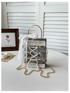Lolita lace box handbag with gold chain cross-lacing design and sweet bow detail.