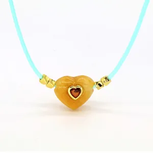 Chic European style blue wax rope necklace featuring a yellow heart stone copper crystal pendant.