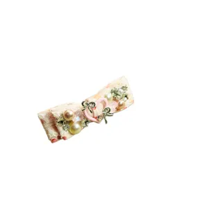 Jolie pince à cheveux nœud perle strass accessoire élégant pour femme et fille chic