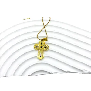Collier pendentif croix en acier titane doré avec strass et émail noir image principale