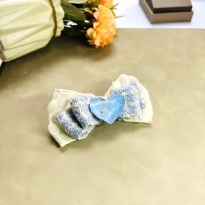 Sweet bow hair clip for women, blue tweed hair barrette with blue heart rhinestone decor.