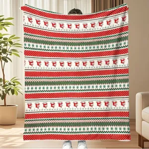 Christmas flannel blanket featuring traditional stripes, plaid, snowflakes, and festive reindeer.