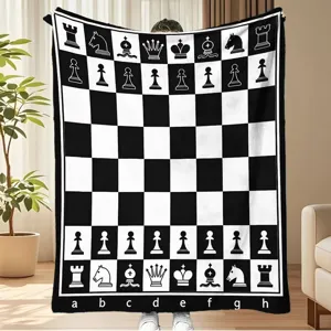 Black and white chess board fleece blanket, warm soft flannel throw for room decor.
