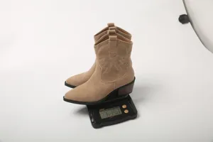 Women western cowboy boots retro embroidered chunky heel mid calf boots detail view weight