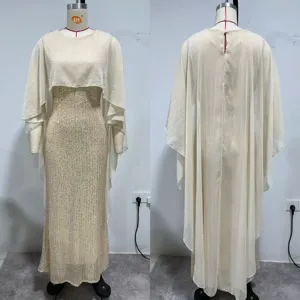 Detail view of elegant sequined evening dress with cape, sleeveless slim long gown for women.