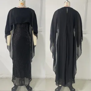 Elegant black sequin maxi dress with sheer chiffon cape, perfect for evening parties.