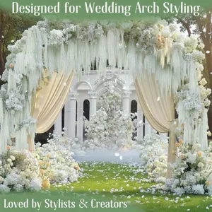 Wedding arch floral decor hanging dried flowers and elegant drapes for romantic event styling setup.