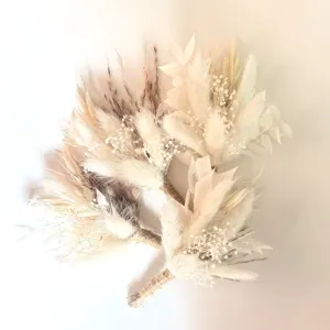 Natural dried flower boutonnieres and mini bouquets for wedding party and holiday decor.