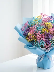 Detailed view of colorful dyed baby's breath bouquet wrapped in blue paper for home decor.