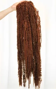 Hanging dried amaranth flower detail view, natural brown color tone, floral arrangement accent.