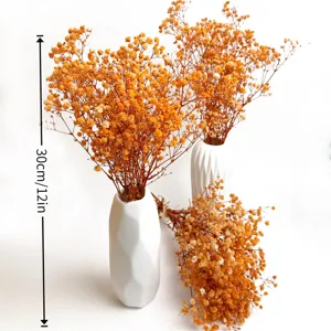 Dried baby's breath flowers with white ceramic vases, perfect for wedding and home decor.