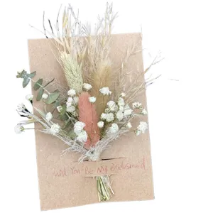 Detailed close-up of handmade dried flower bouquet greeting card for bridesmaid invitation.
