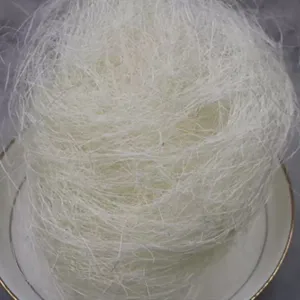 Plant fiber hemp silk filler for gift box packaging and wedding decoration, fluffy white material.