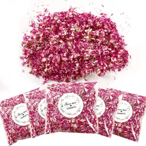 Natural dried flower petals detail shot, biodegradable wedding confetti in clear bags close up.