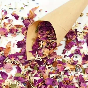 Detail shot of colorful natural dried rose flower petals confetti for party decoration.