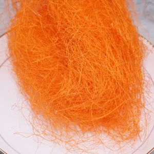 Orange sisal fiber packing filler for gift boxes, wedding decoration, and craft projects.