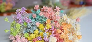 Close-up view of colorful dried flowers bouquet, ideal for DIY crafts and home decoration.