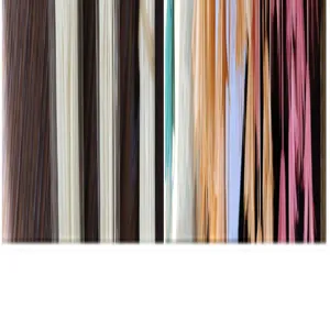 Detailed view of multi-color synthetic hair extension color chart swatches displaying various tones.