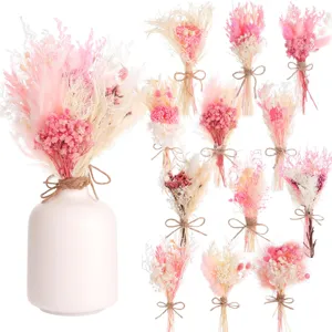 Mini dried flower bouquets set with ceramic vase, perfect for bohemian wedding table decor.