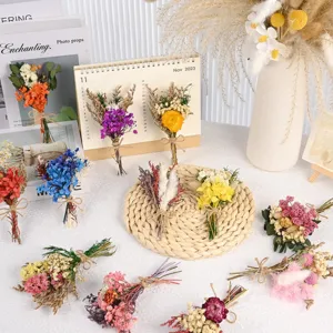 Mini dried flower bouquets set detail, rustic botanical decor for wedding and table styling.
